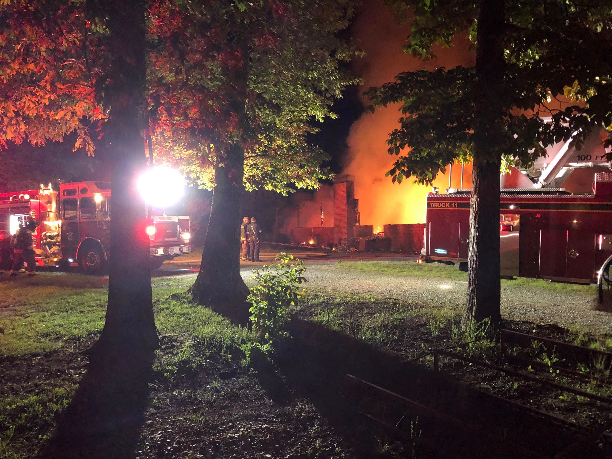 Cherokee County firefighters arrive on the scene to extinguish the fire (photo by Jimmy Kelley).