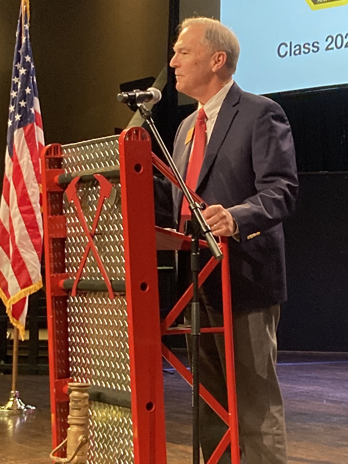 Harry Johnston, Chairman of the Cherokee County Board of Commissioners, comes forward to say a few words.