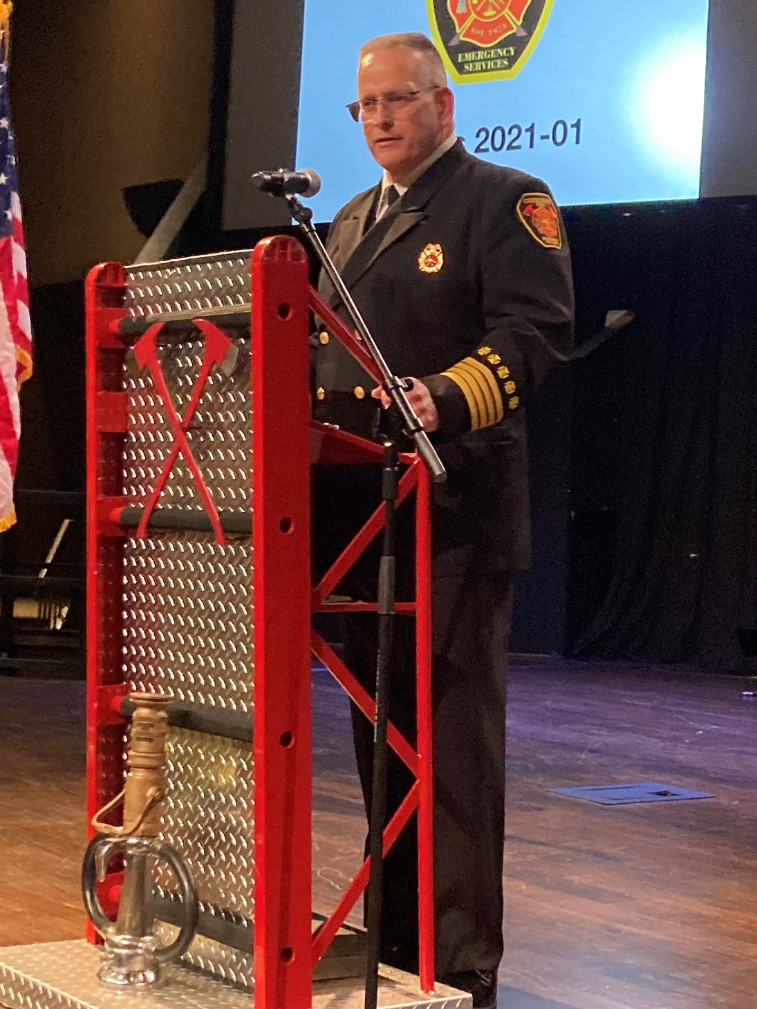 Eddie Robinson, Deputy Chief of Support Services, comes to the podium to speak.