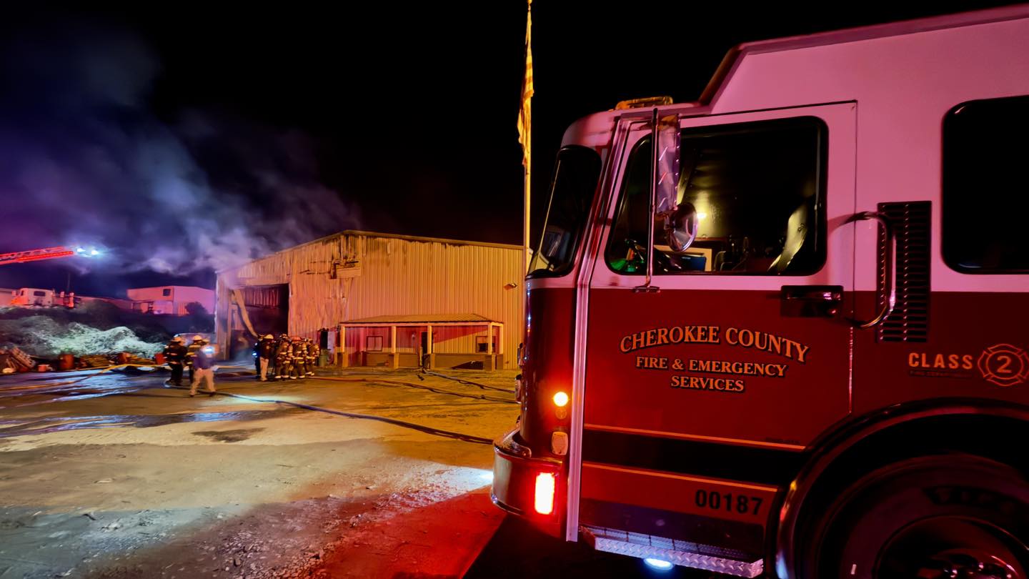 Firefighters battle a fire in a commercial structure. 