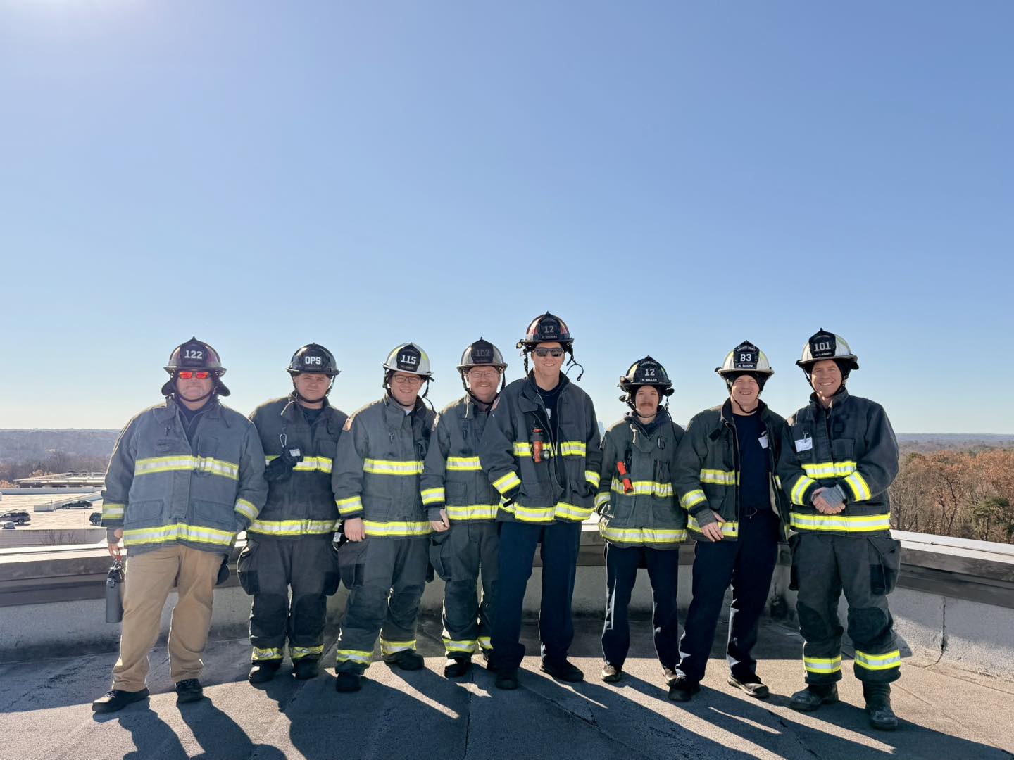 Members of Cherokee Fire prepare to rappel.