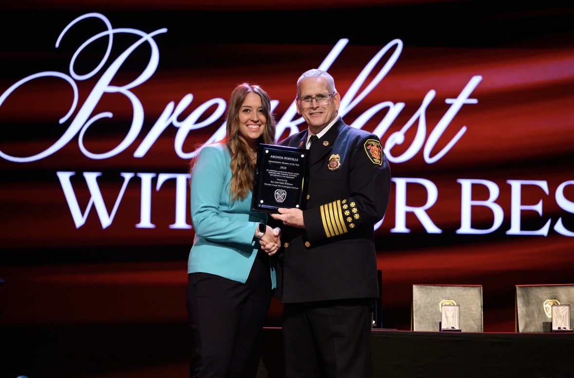 Budget Manager Amanda Postelle receives her award. 