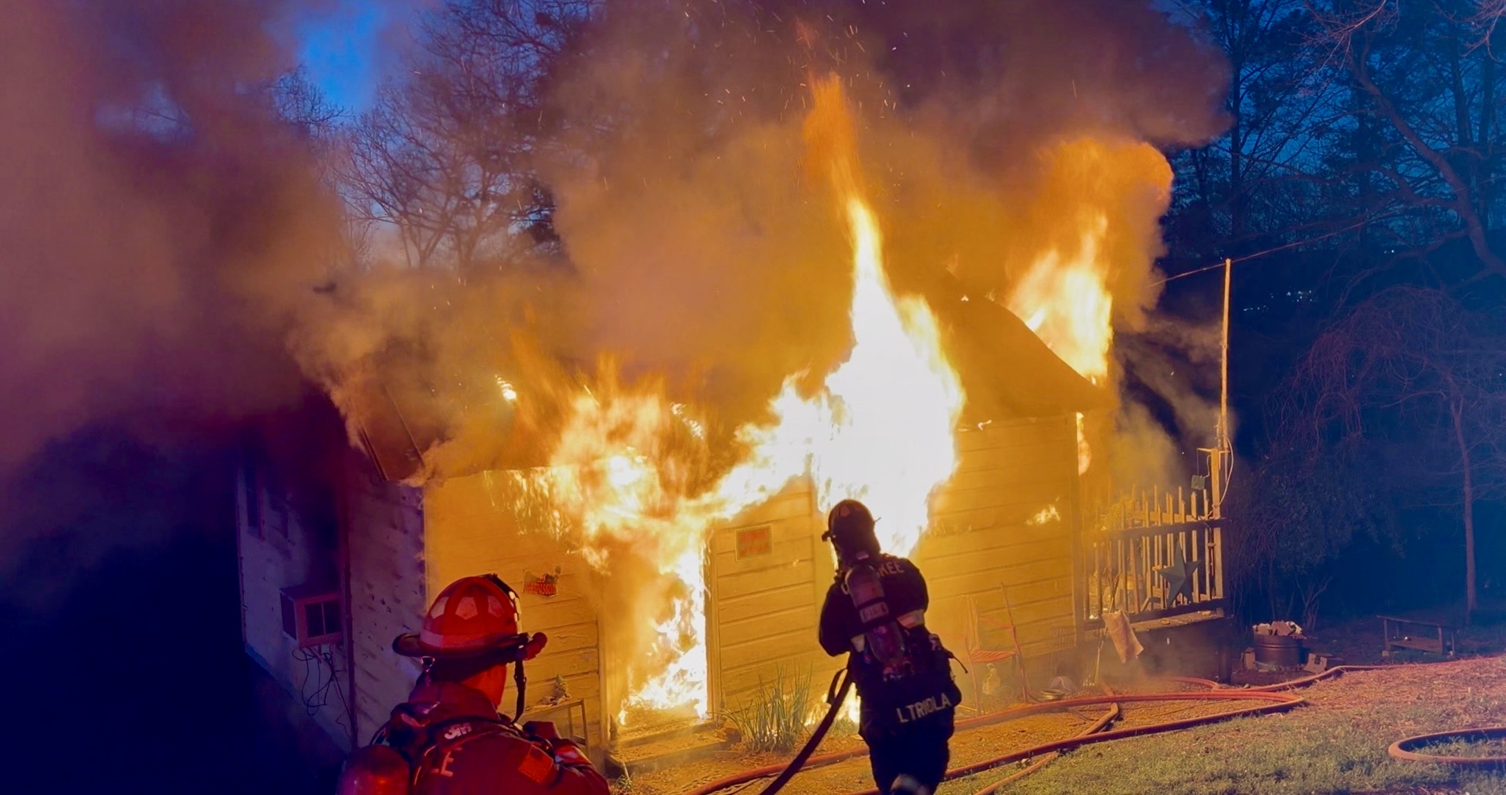 Firefighters working at a fire on Killian St. 