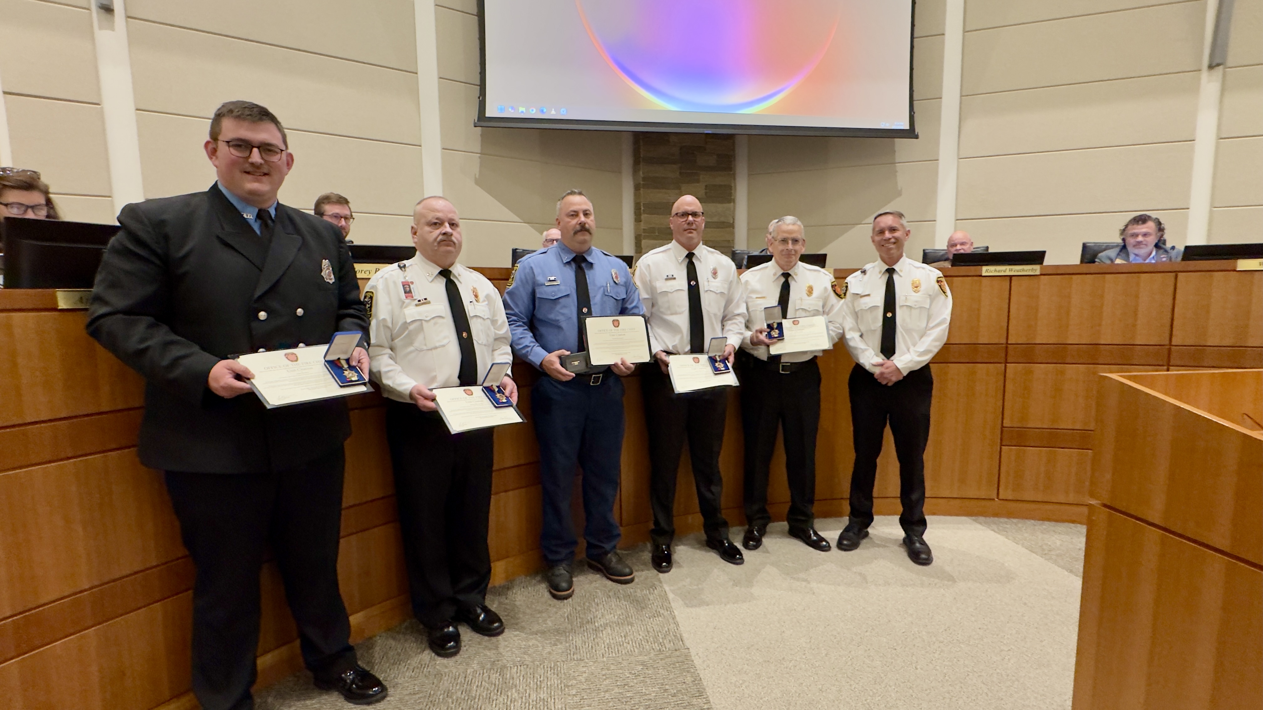 Firefighters receive a Unit Citation for their work at a recent incident. 
