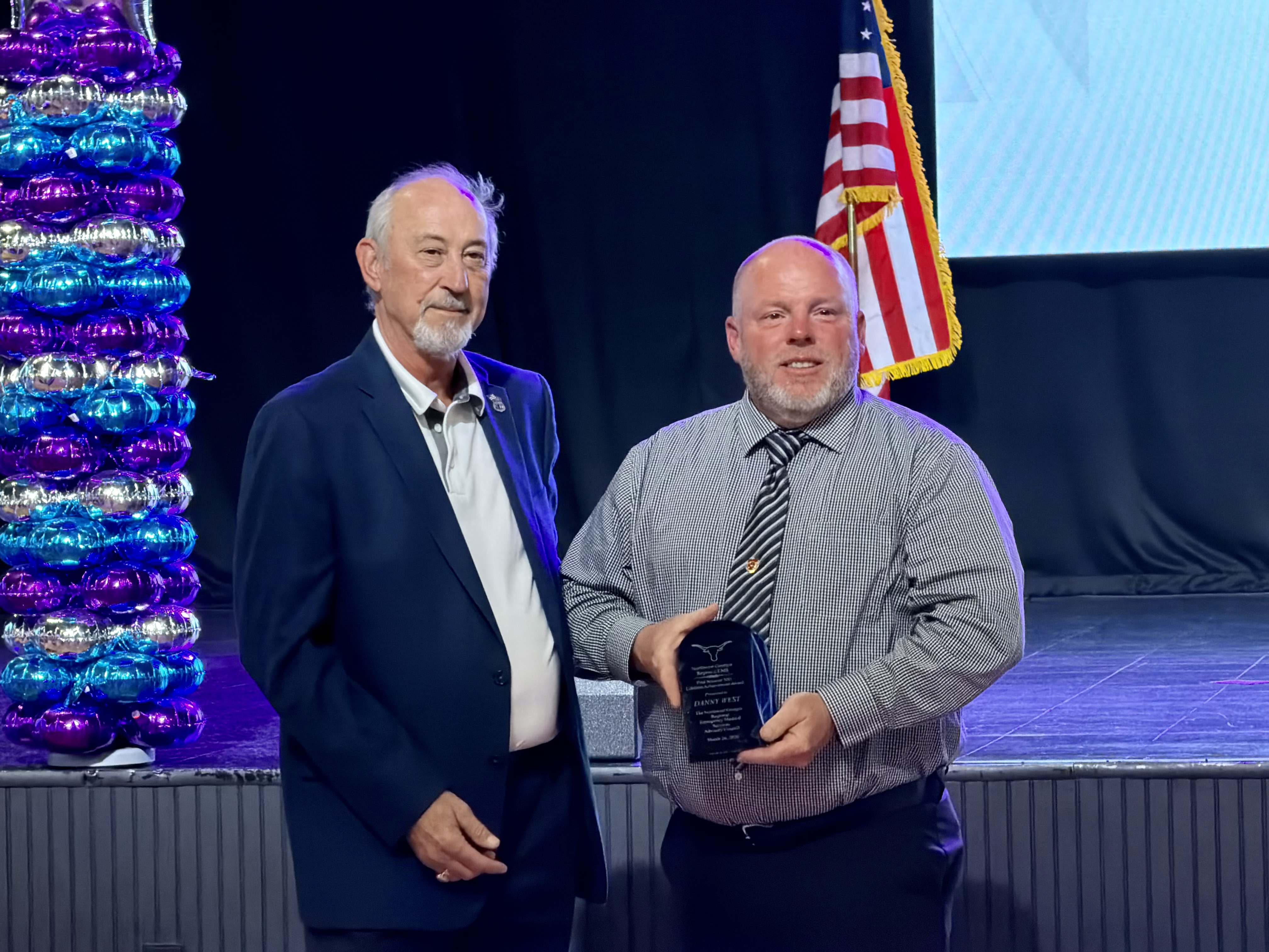 Retired Division Chief of EMS Danny West receiving the Dr. Paul “Nasty” Nassour Lifetime Achievement Award